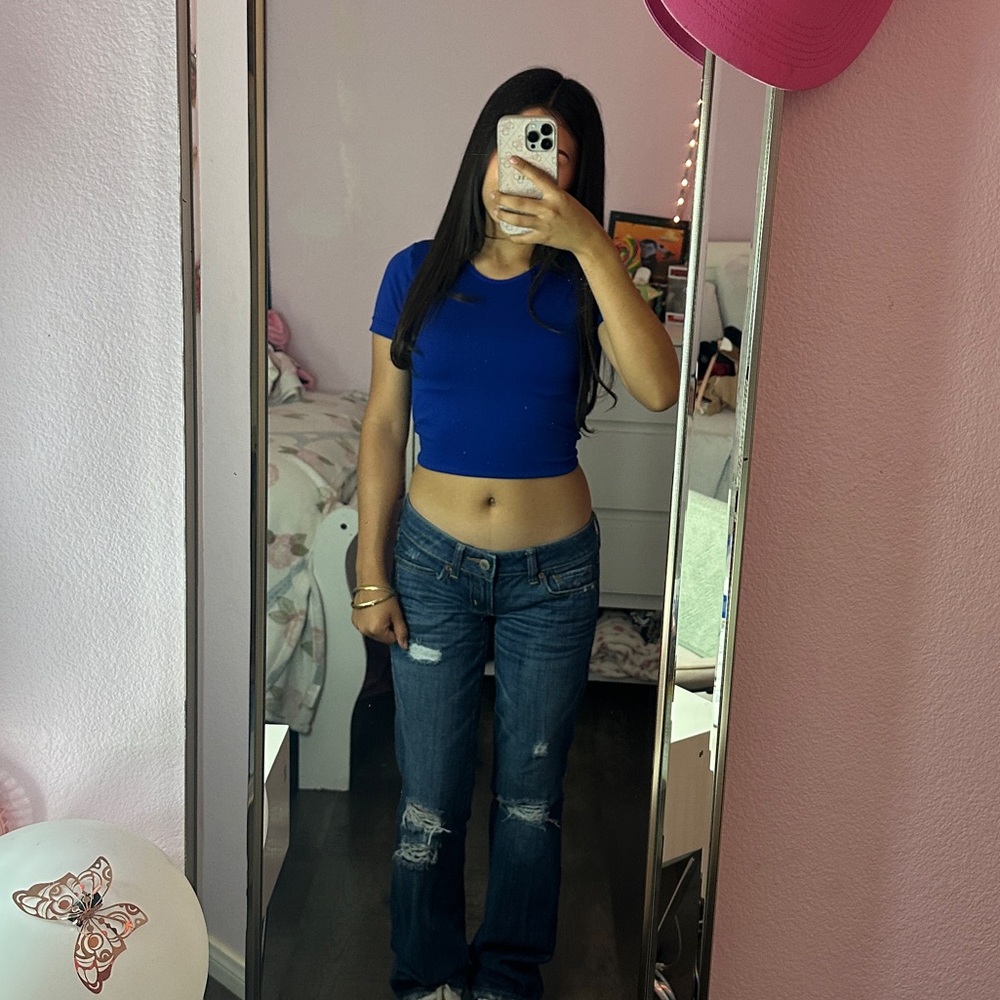 Blue Crop Top and Distressed Jeans
